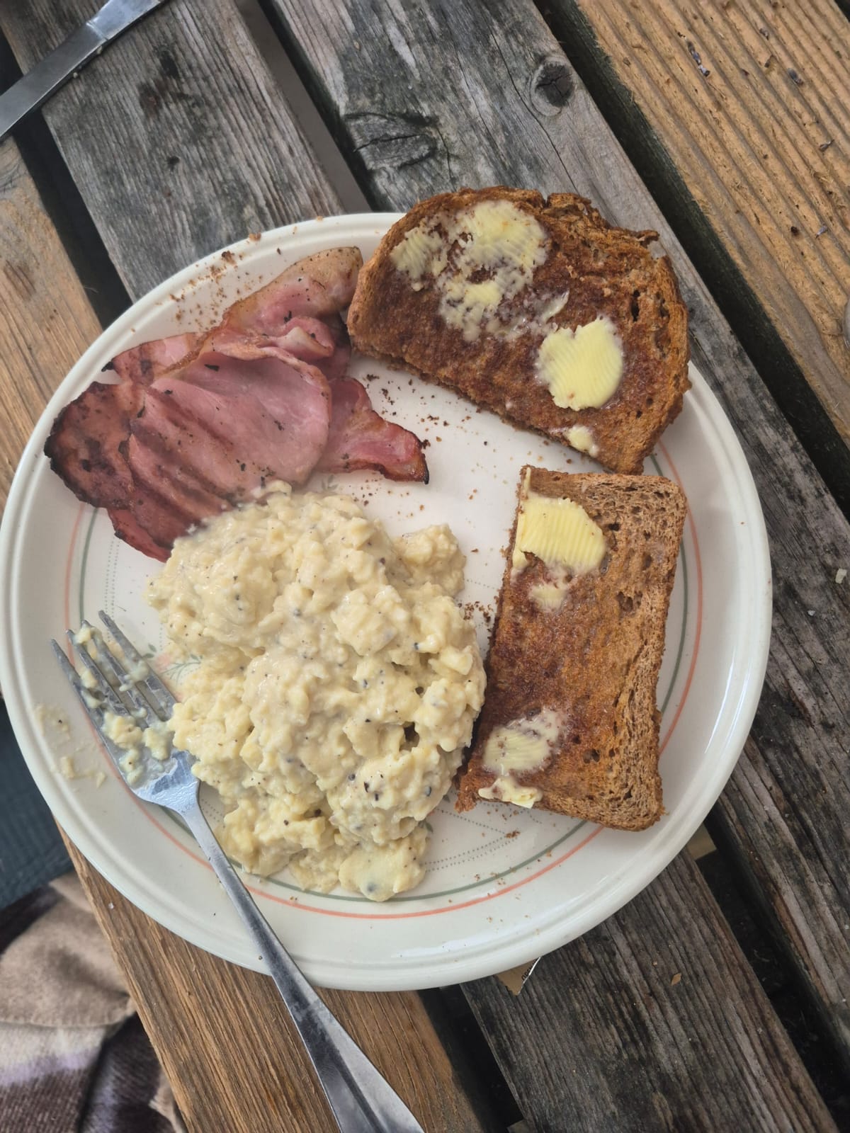 Bacon, bread and scrambled eggs